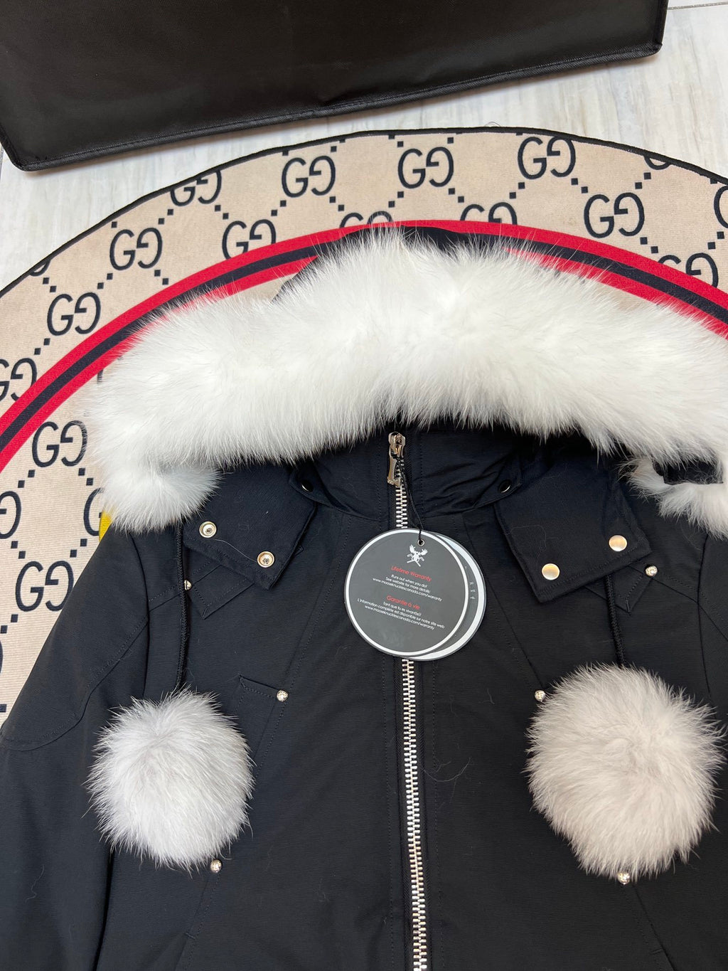 Moose Knuckles Black Cropped Hooded Bomber Jacket with Pom-Poms