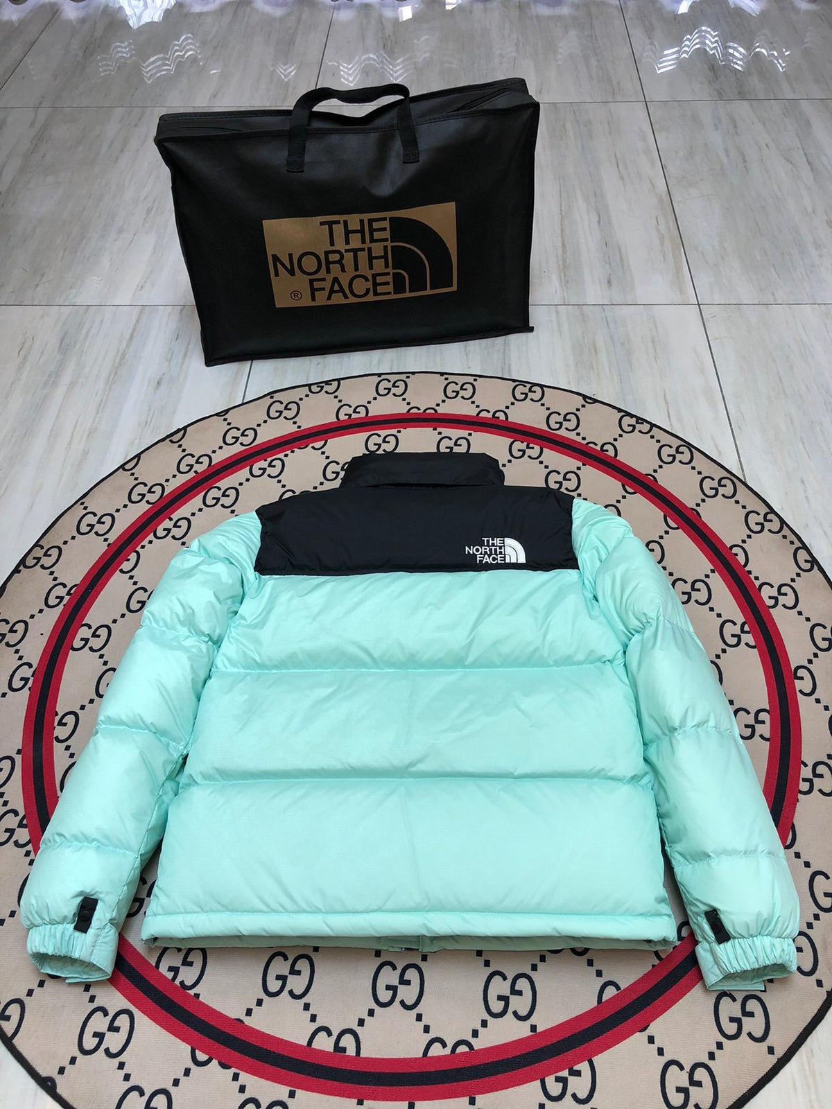 The North Face Mint Green and Black Colorblock Puffer Jacket