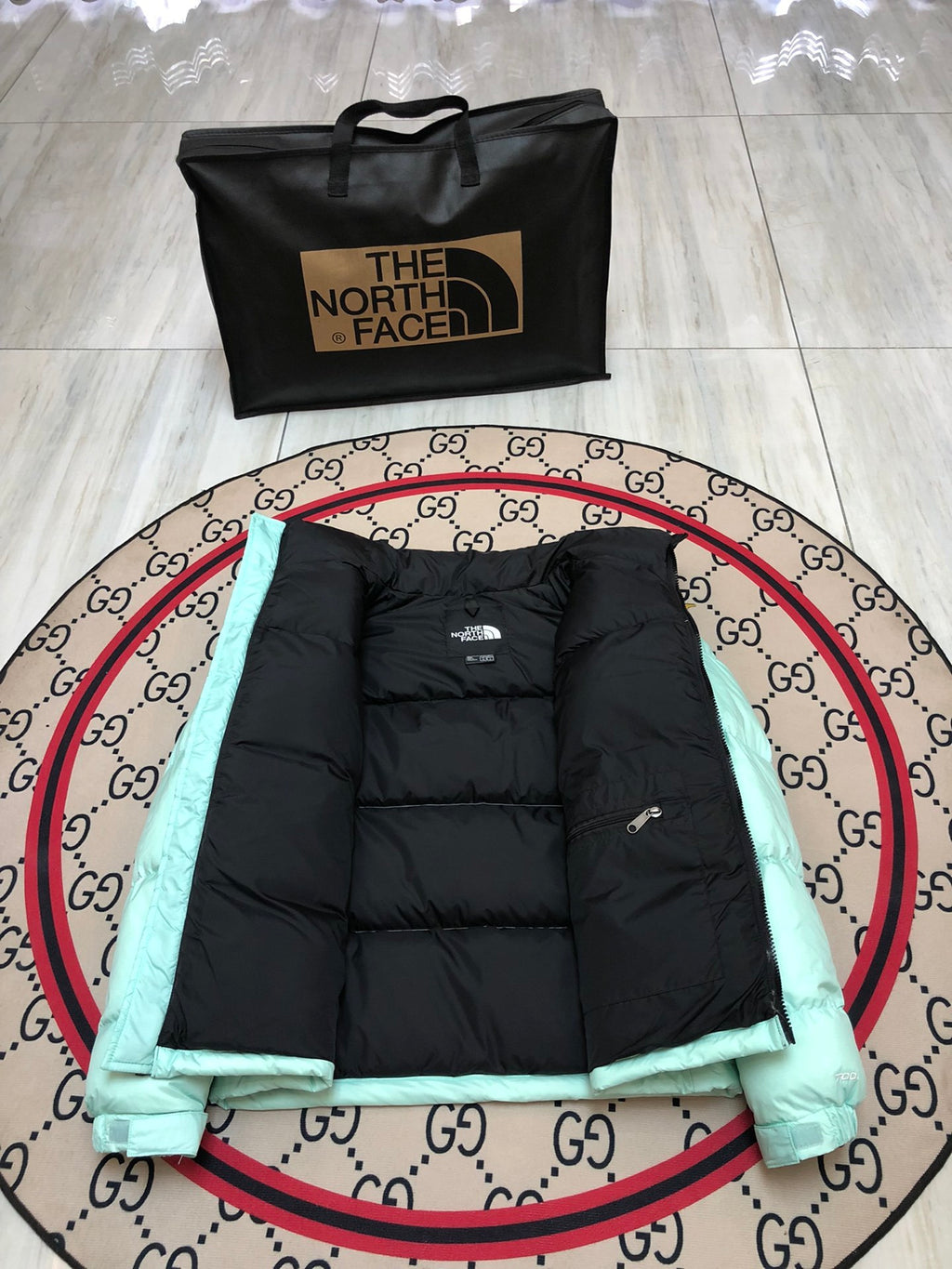 The North Face Mint Green and Black Colorblock Puffer Jacket