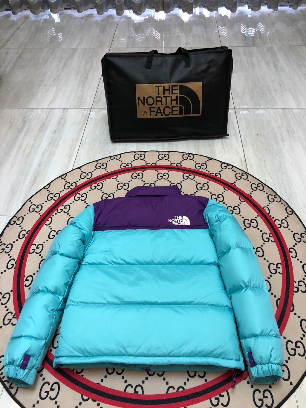 The North Face Turquoise and Purple Colorblock Puffer Jacket