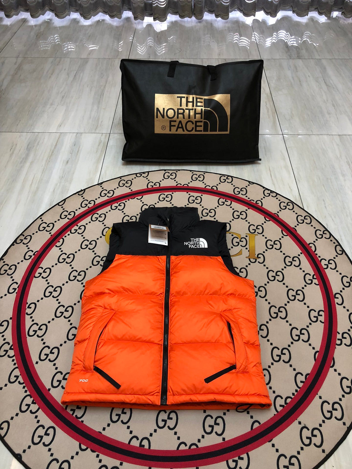 The North Face Orange and Black Color-Block Puffer Vest
