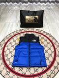 The North Face Royal Blue and Black Color-Block Puffer Vest