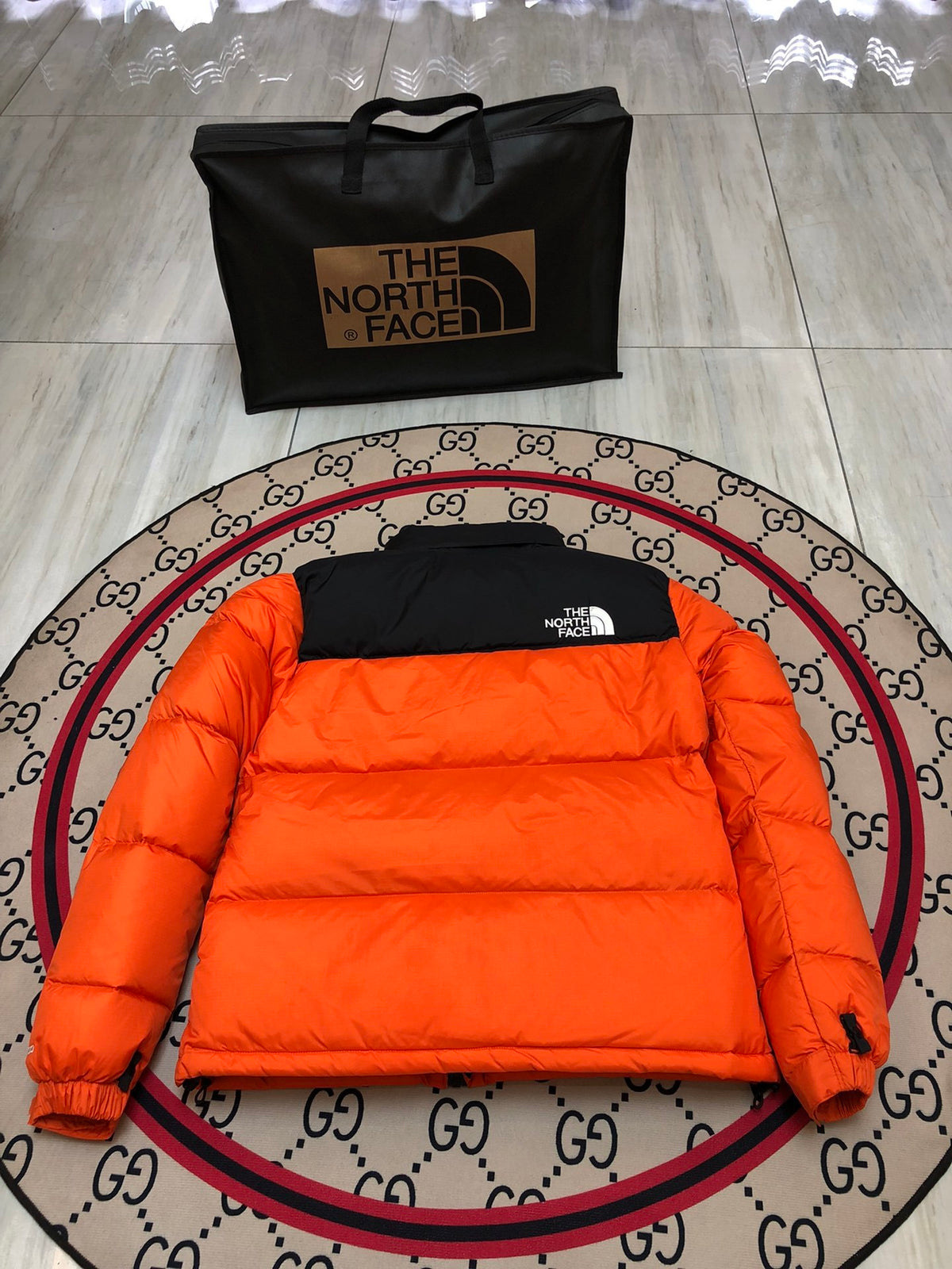 The North Face Orange and Black Color-Block Puffer Jacket