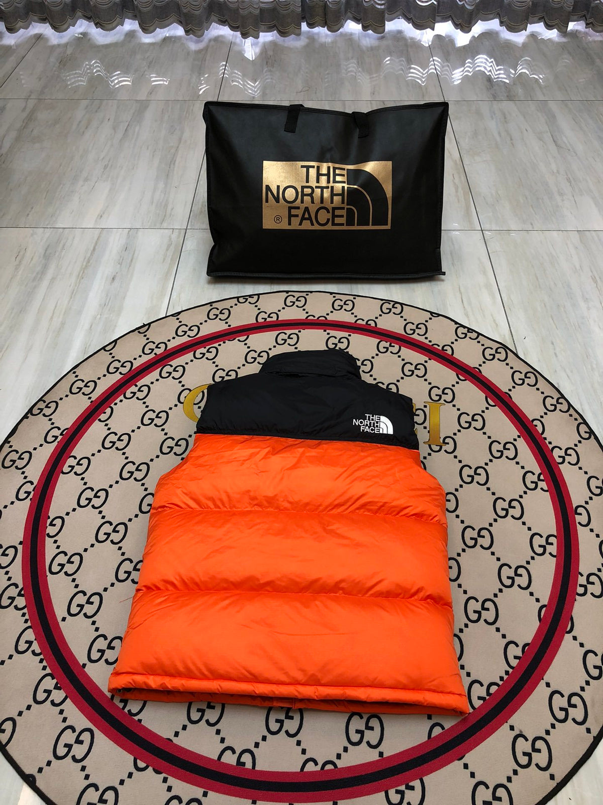The North Face Orange and Black Color-Block Puffer Vest