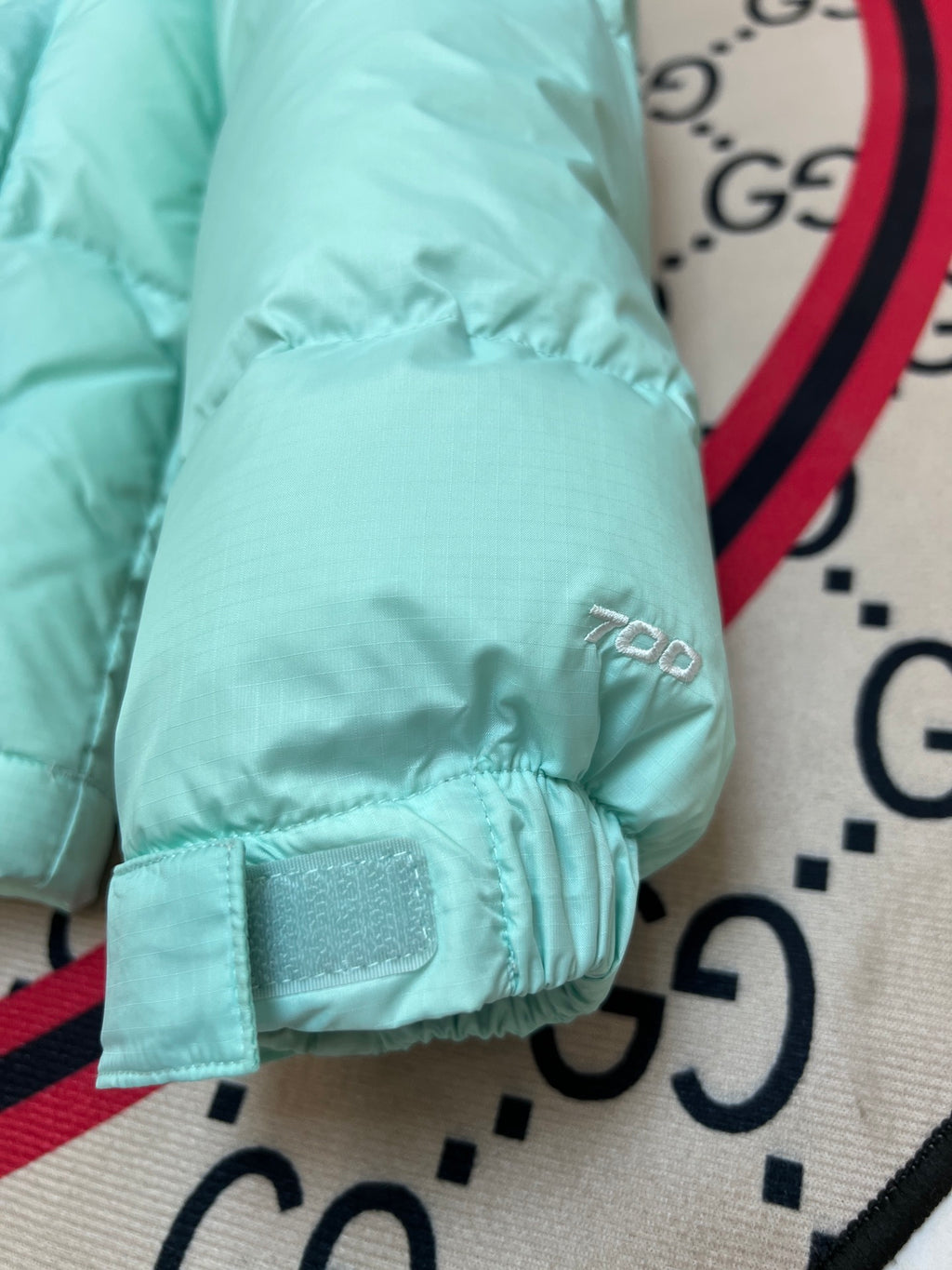 The North Face Mint Green and Black Colorblock Puffer Jacket