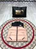 The North Face Blush Pink and Black Color-Block Puffer Vest