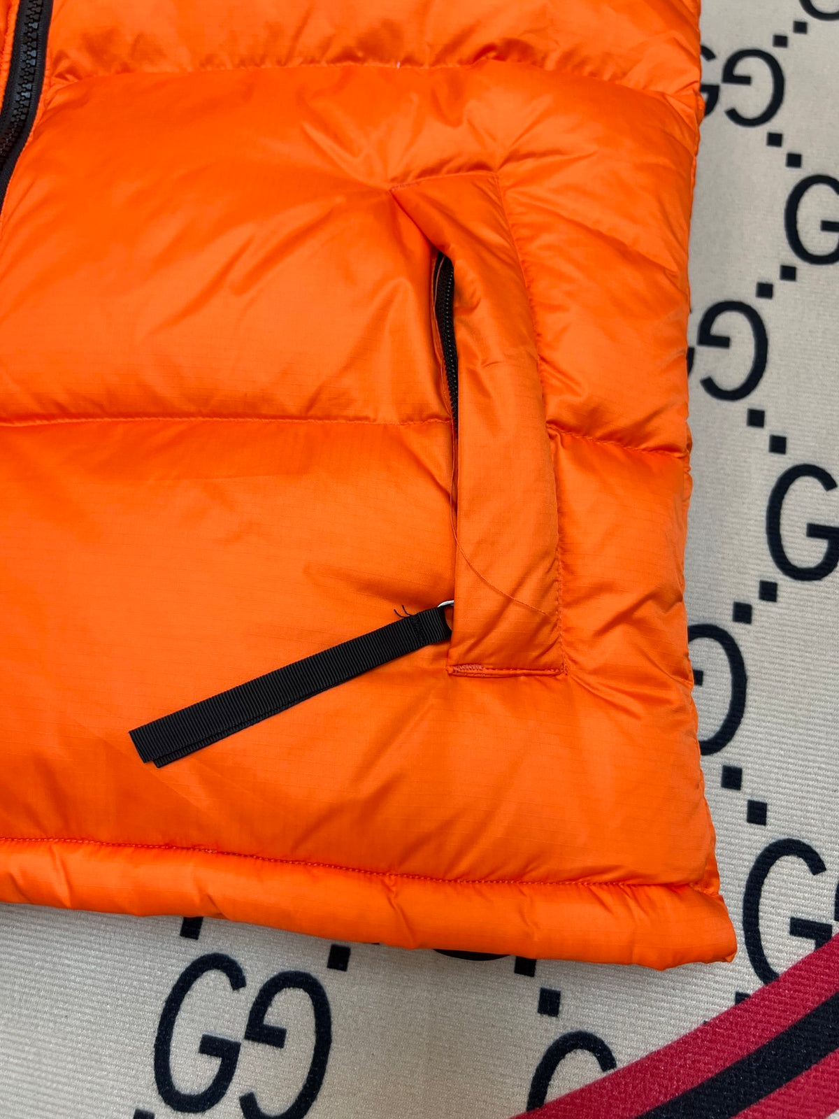 The North Face Orange and Black Color-Block Puffer Vest