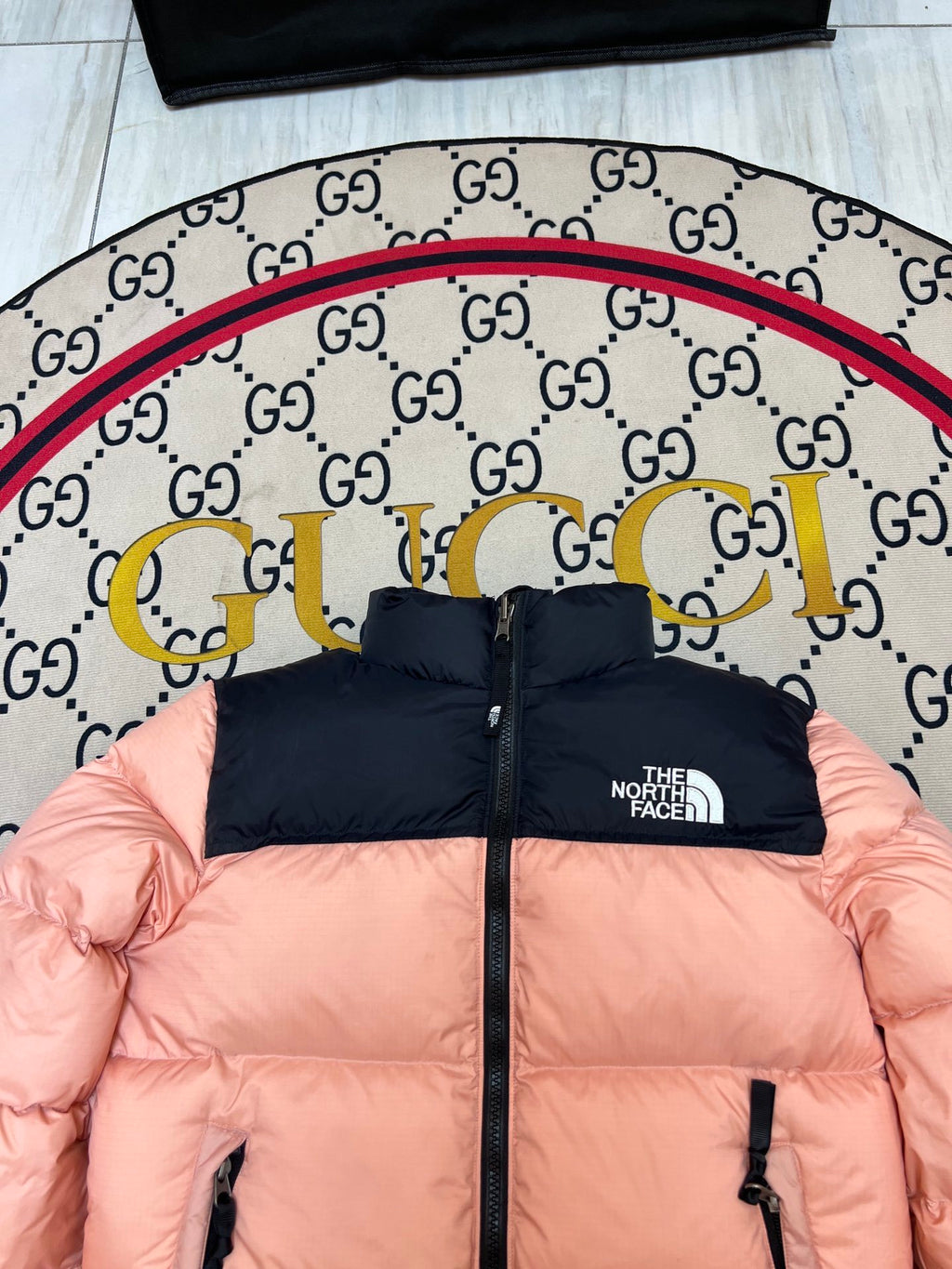 The North Face Peach Pink and Black Colorblock Puffer Jacket