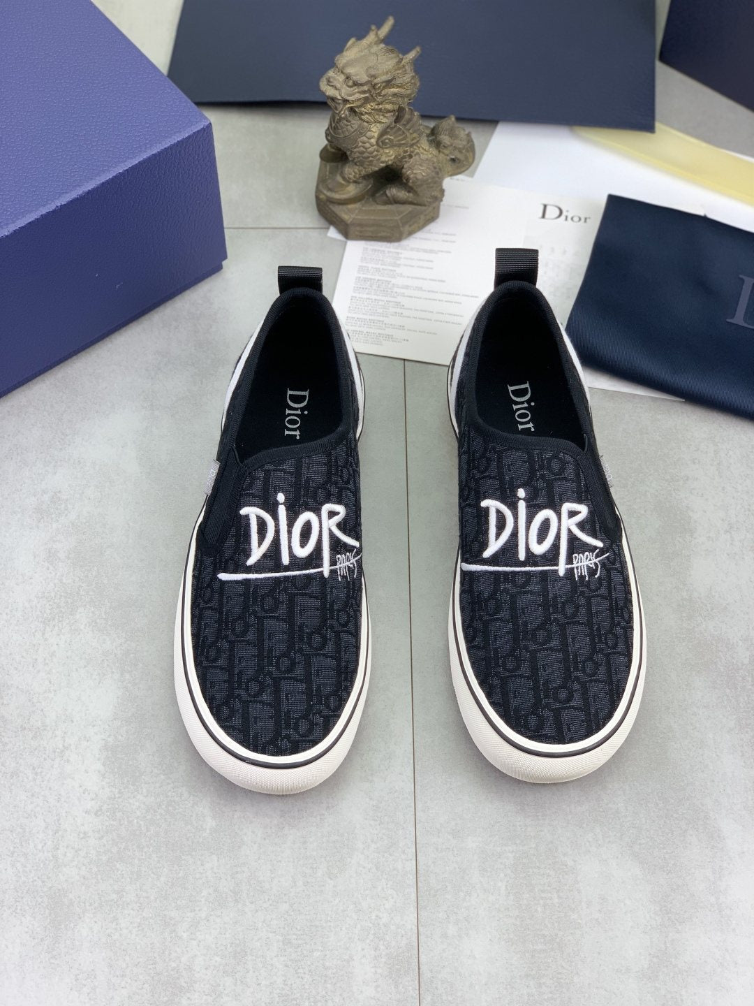 Dior Logo-Pattern Canvas Slip-On Sneakers - Black and White